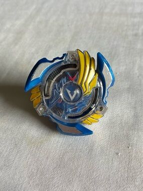 Beyblade Blue & Yellow Spinning Top with Clear Emblem